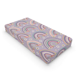 Posy Rainbows changing pad cover on a nursery changing table