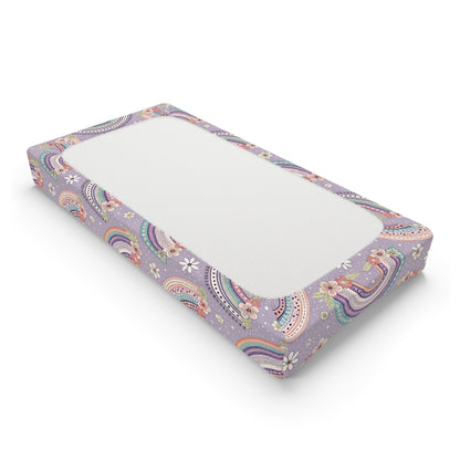 Changing pad cover with banded rainbows and coral posies