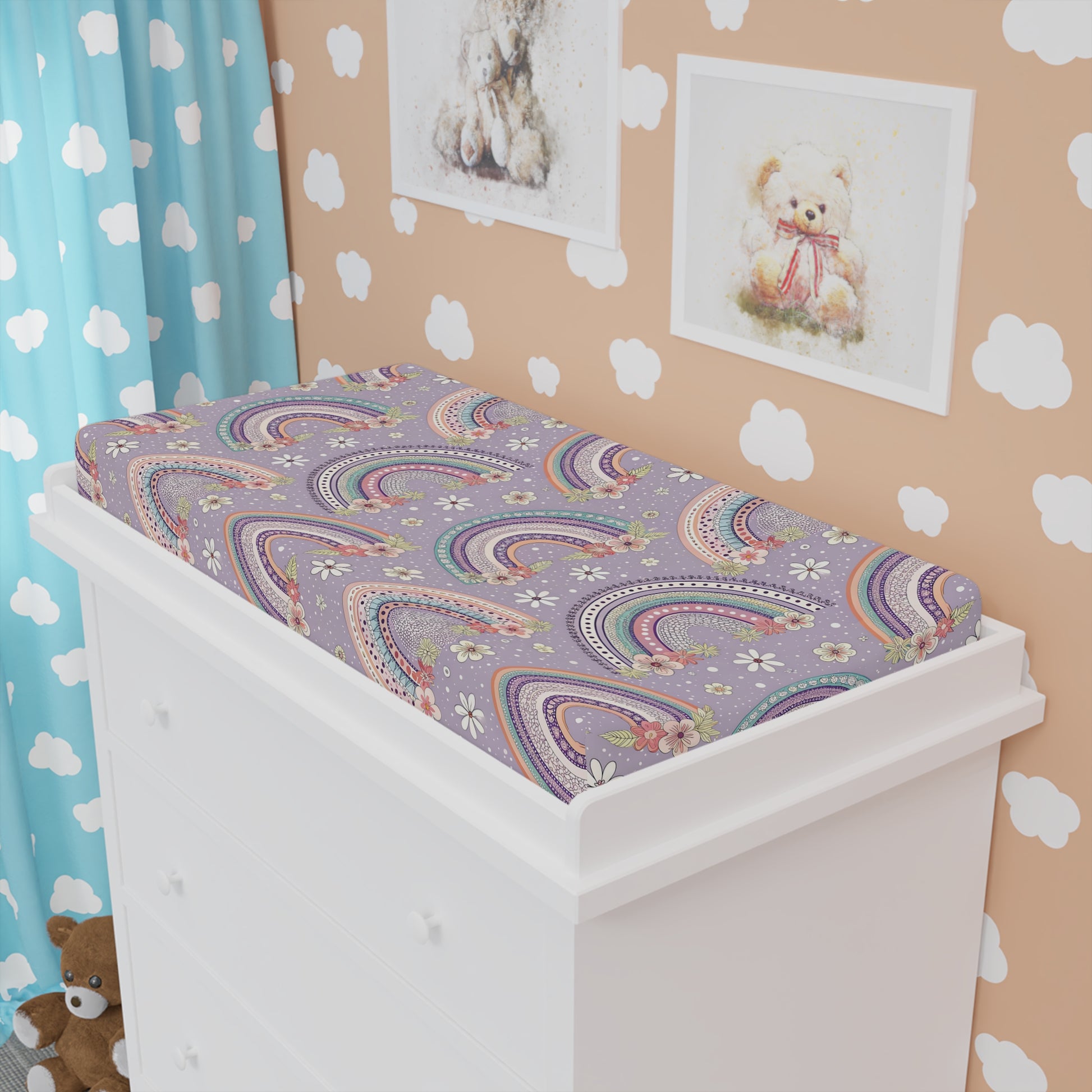 Posy Rainbows changing pad cover fitted over a contoured pad