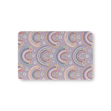 Posy Rainbows fitted crib sheet on a nursery crib mattress