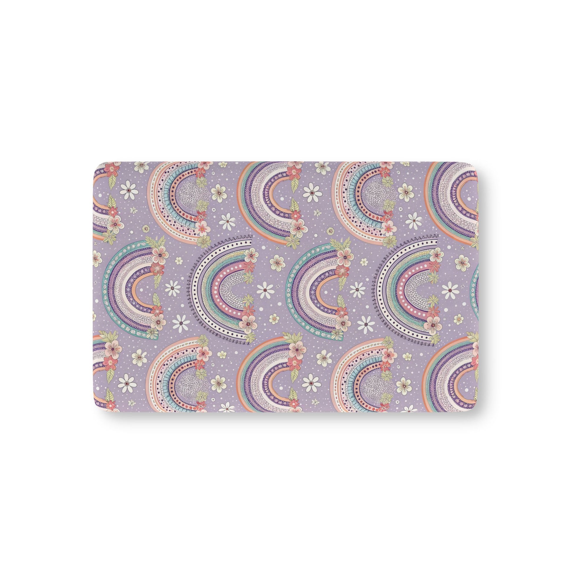 Posy Rainbows fitted crib sheet on a nursery crib mattress