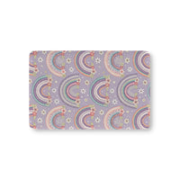 Posy Rainbows fitted crib sheet on a nursery crib mattress