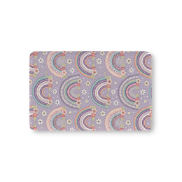 Posy Rainbows fitted crib sheet on a nursery crib mattress