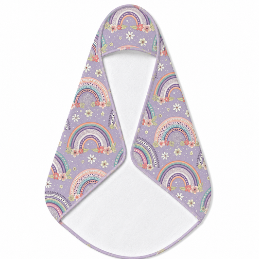 Posy Rainbows hooded baby towel wrapped around a baby