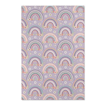 Close detail of the rainbows and posies on the area rug
