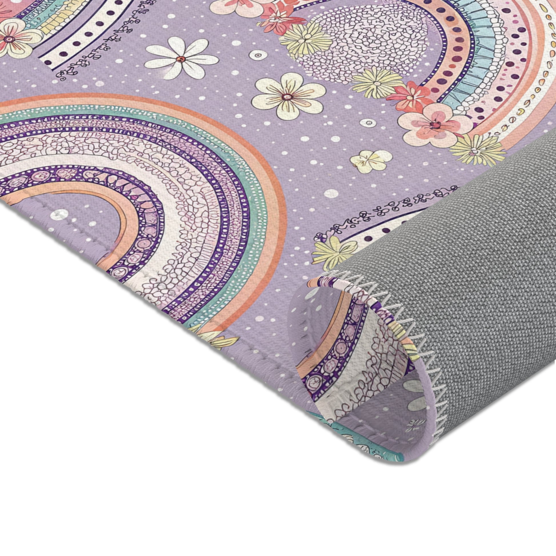 Rainbows, posies and daisies printed across the area rug