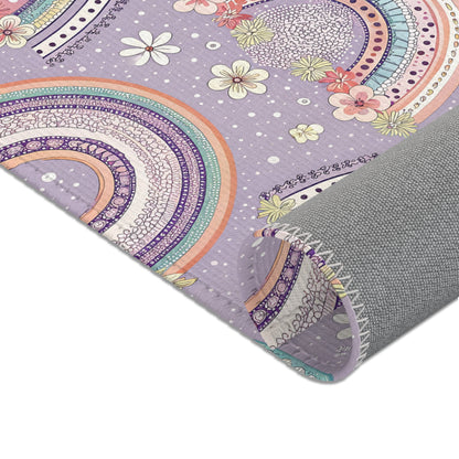 Rainbows, posies and daisies printed across the area rug