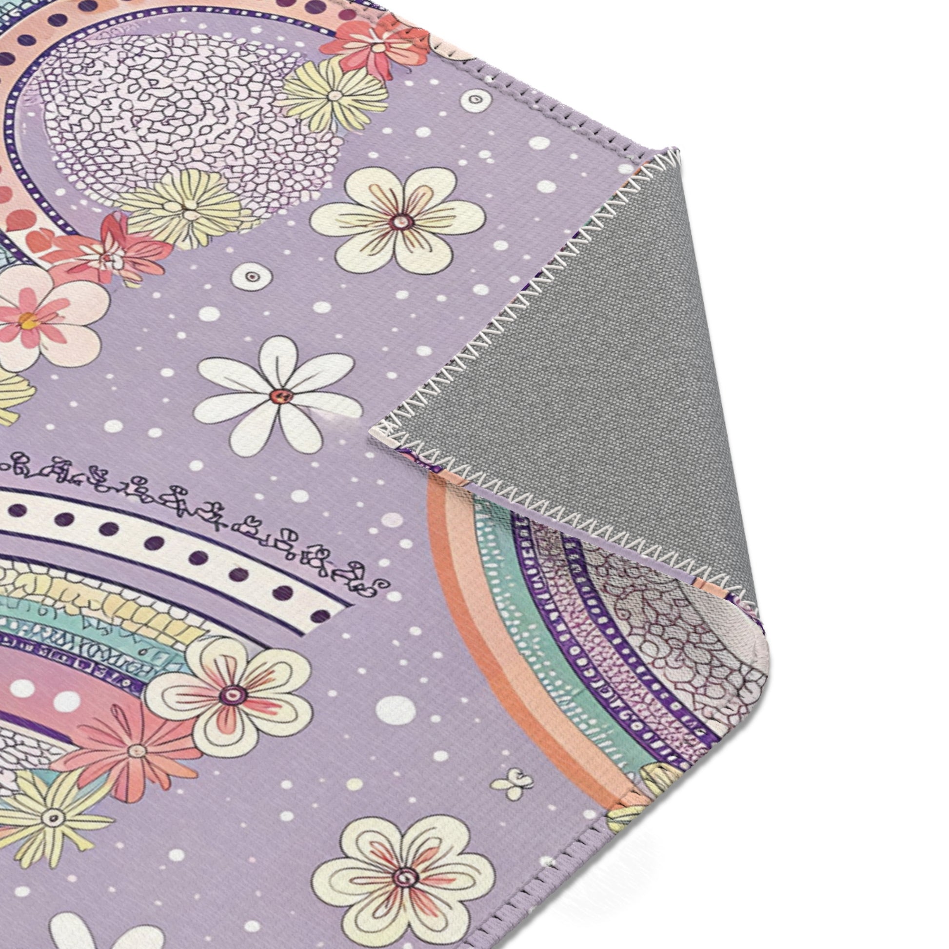 Posy Rainbows rug print detail in mint and coral