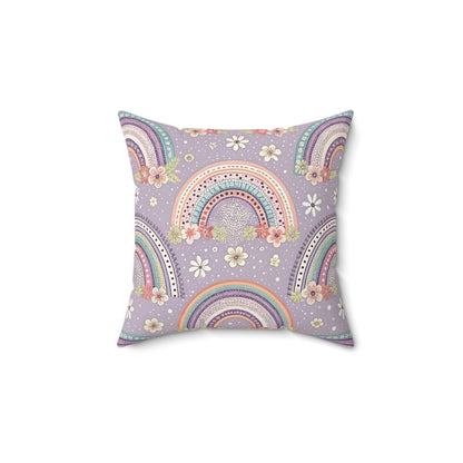Posy Rainbows decorative nursery pillow on a glider chair