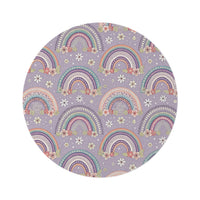 Posy Rainbows round nursery rug on a baby room floor