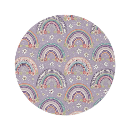 Posy Rainbows round nursery rug on a baby room floor