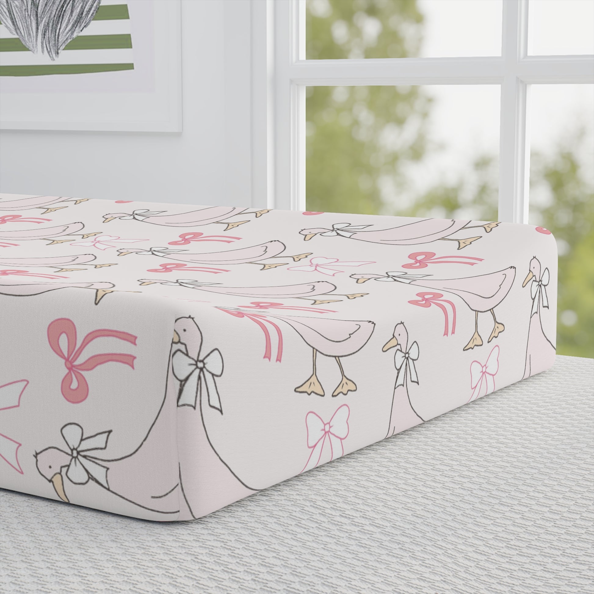 Ribbon Goose pad cover matching the nursery crib sheet