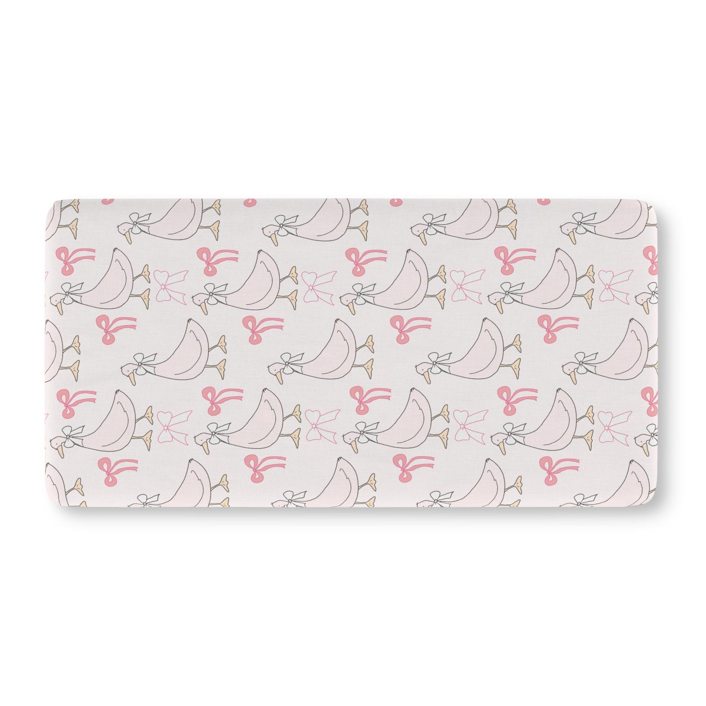 Pink goose crib sheet on a standard crib mattress