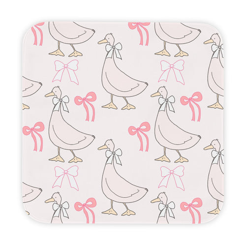 Ribbon Goose hooded baby towel wrapped around a baby
