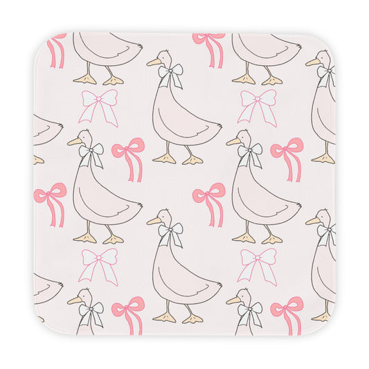 Ribbon Goose hooded baby towel wrapped around a baby
