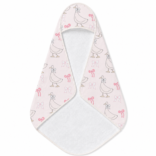 Ribbon Goose hooded baby towel wrapped around a baby