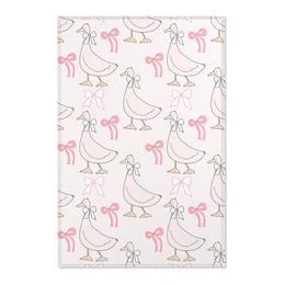 Ribbon Goose nursery area rug in a baby girl's bedroom