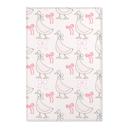 Ribbon Goose nursery area rug in a baby girl's bedroom