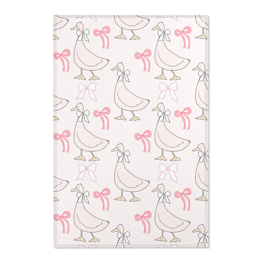 Ribbon Goose nursery area rug in a baby girl's bedroom