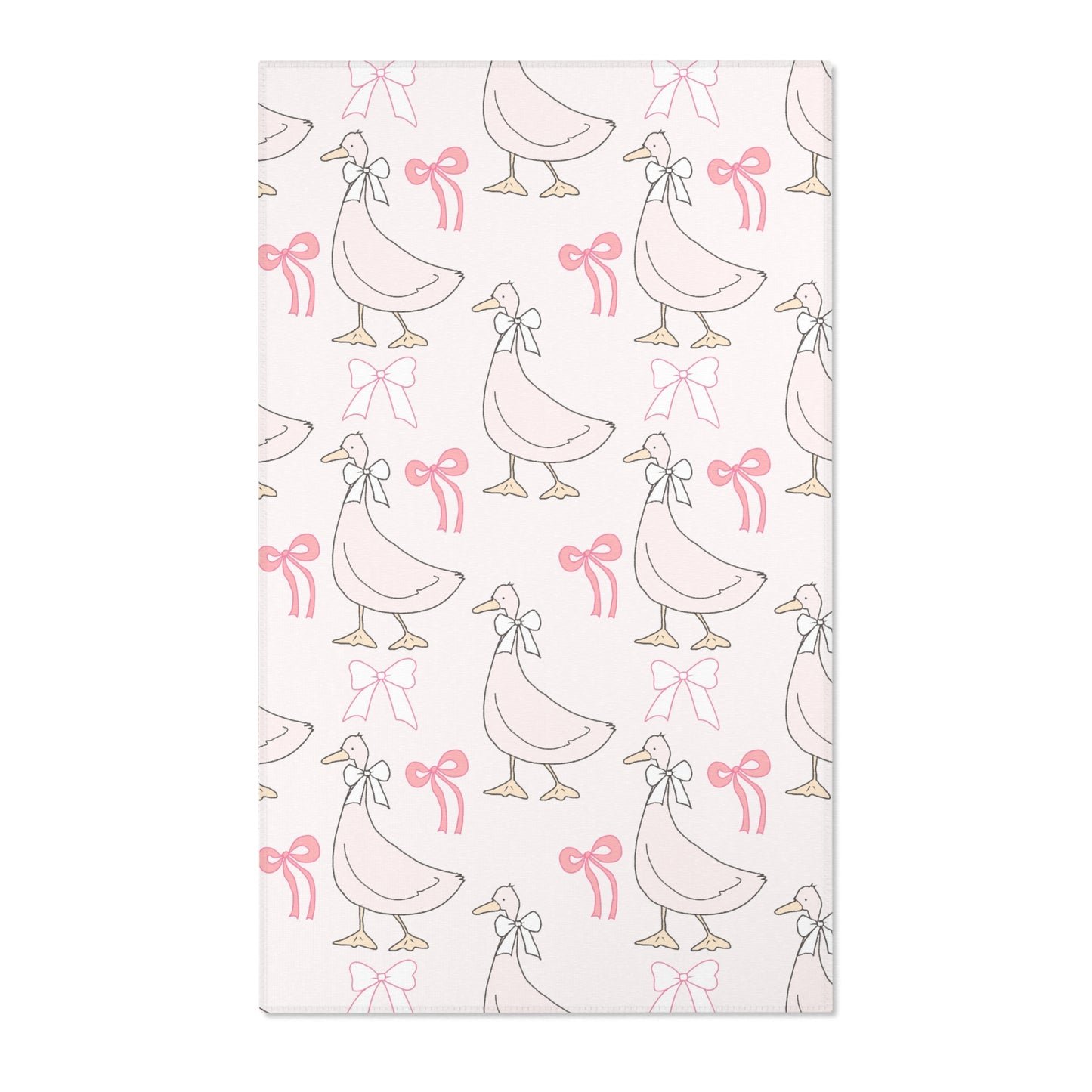 Pink goose and bow nursery area rug on blush