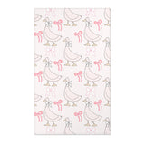 Pink goose and bow nursery area rug on blush