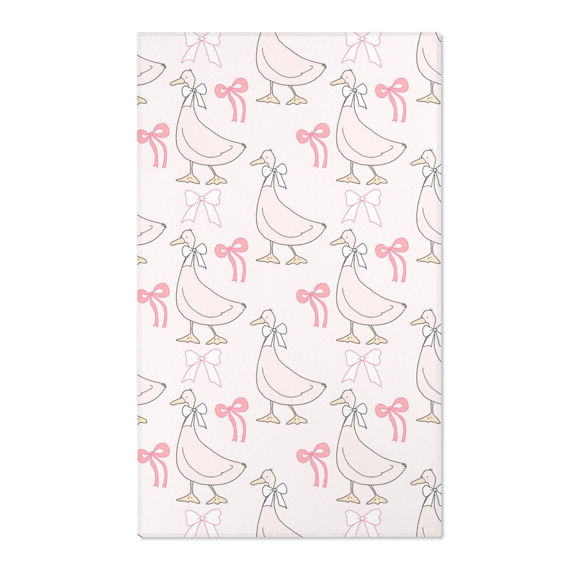 Pink goose and bow nursery area rug on blush