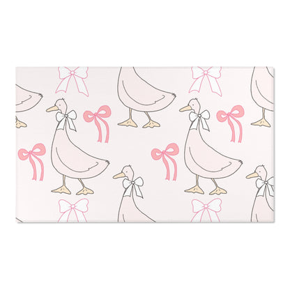 Ribbon Goose area rug on a light wood floor