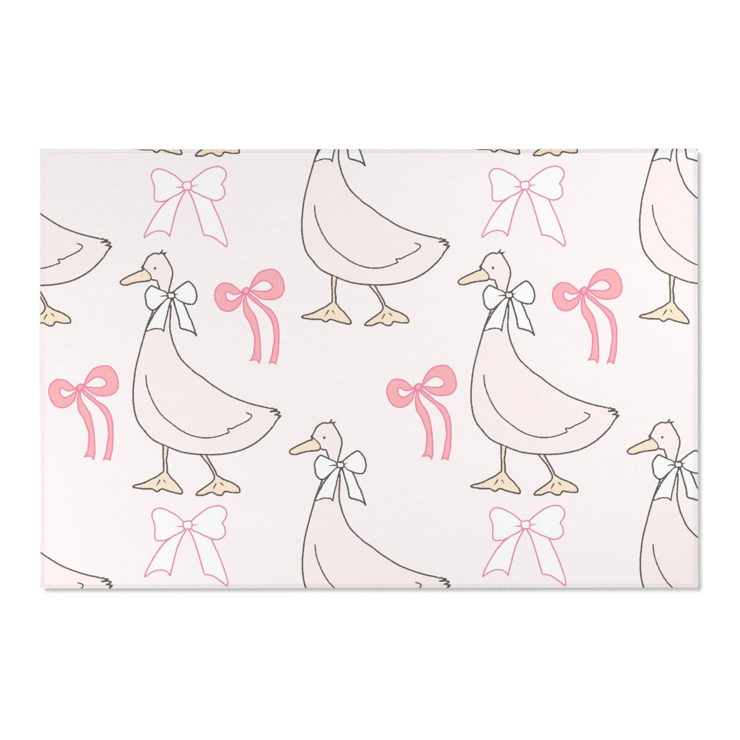 Soft pink goose rug defining a nursery play area