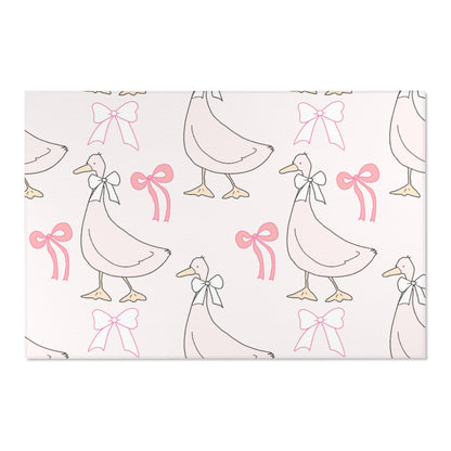 Soft pink goose rug defining a nursery play area