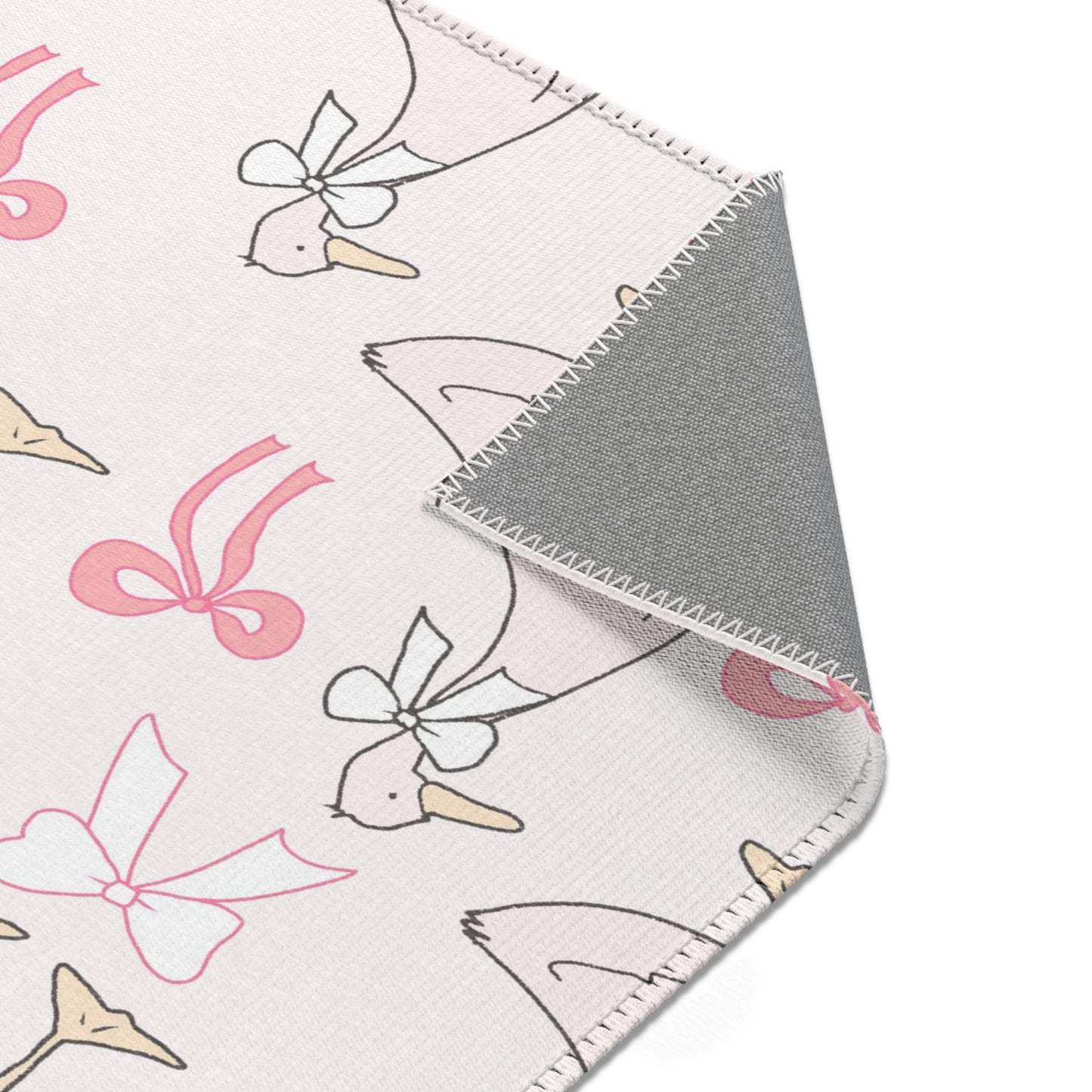 Ribbon Goose rug in a baby girl's nursery