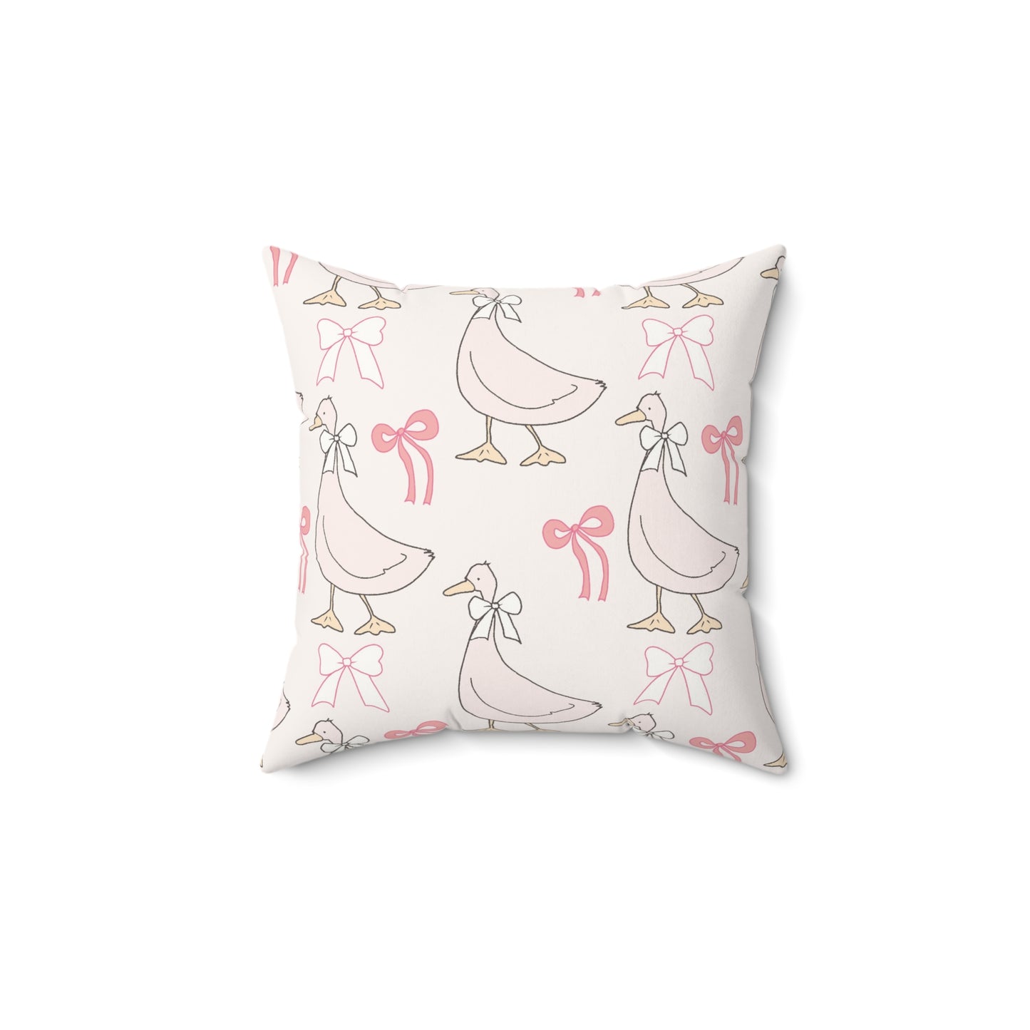 Ribbon Goose decorative nursery pillow on a glider chair