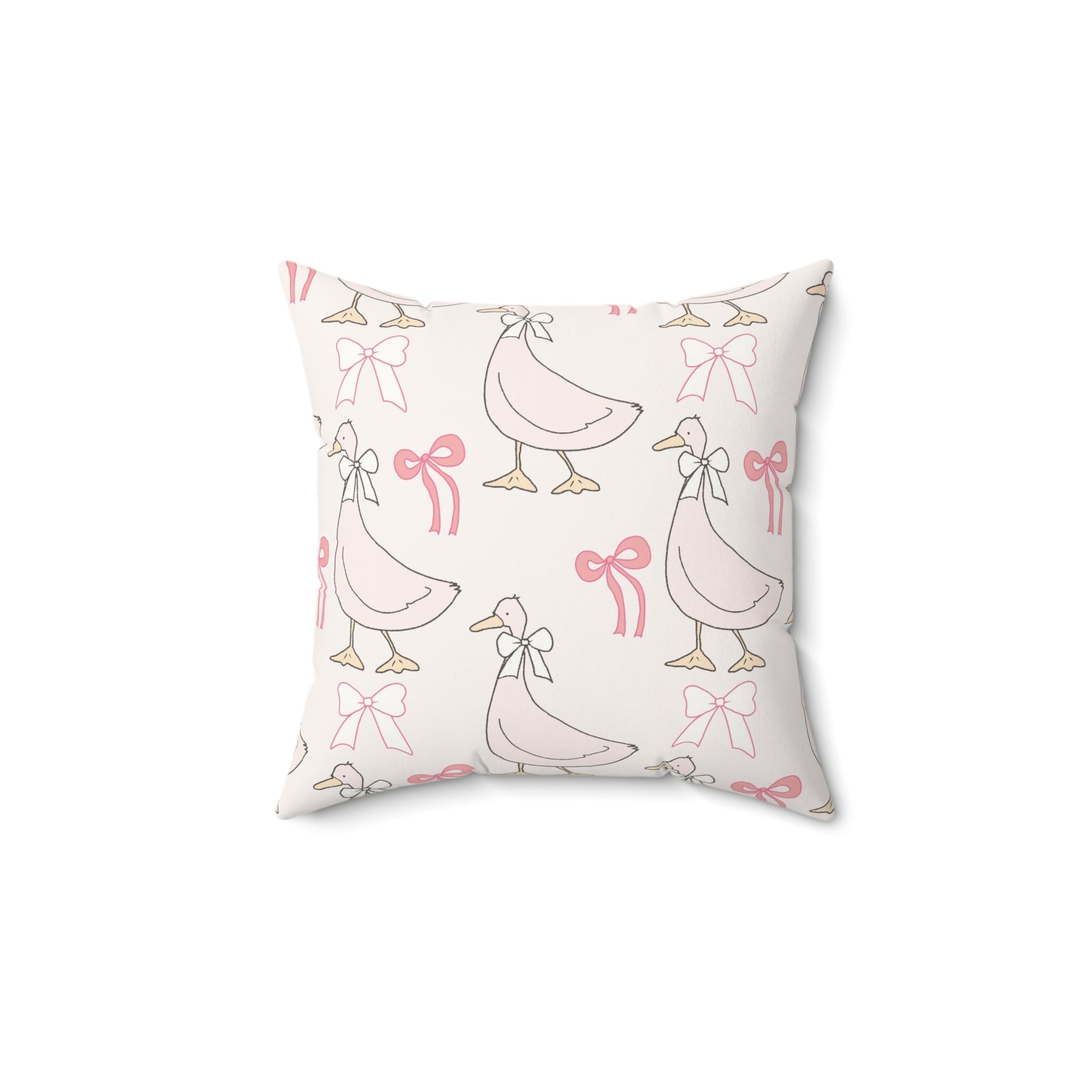 Ribbon Goose decorative nursery pillow on a glider chair