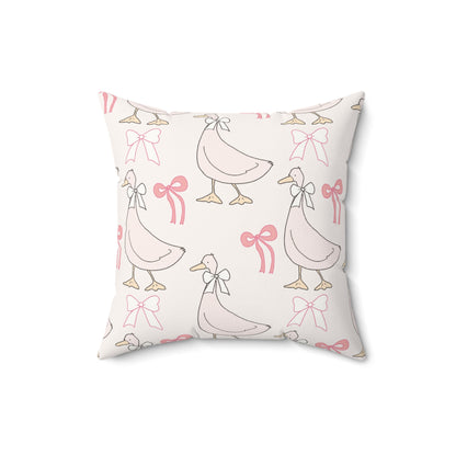 Faux suede nursery pillow in soft pink geese and bows