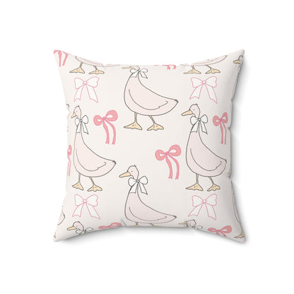 Ribbon Goose pillow, geese in bows on a blush ground