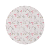 Ribbon Goose round nursery rug on a baby room floor