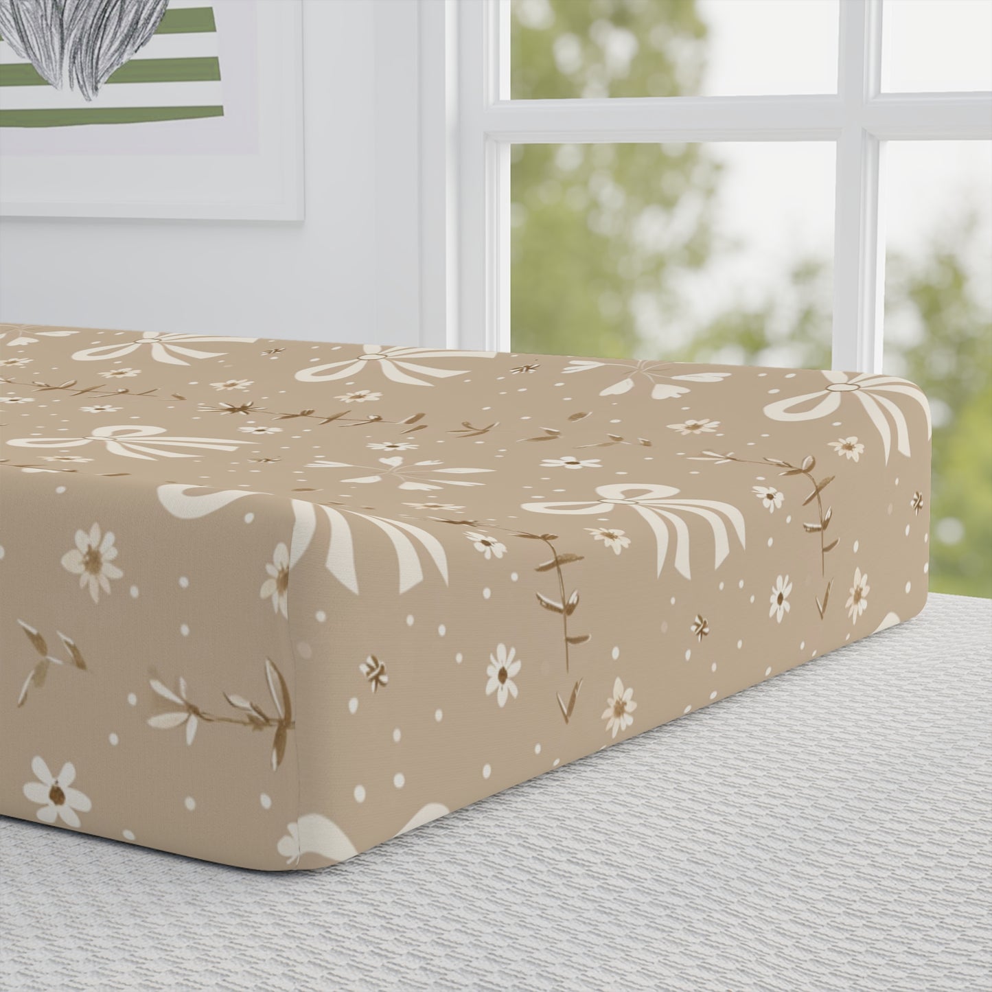 Close detail of the Ribbon Meadow print on the changing pad cover