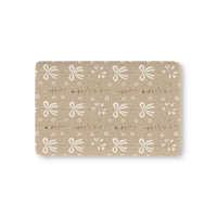 Ribbon Meadow fitted crib sheet on a nursery crib mattress