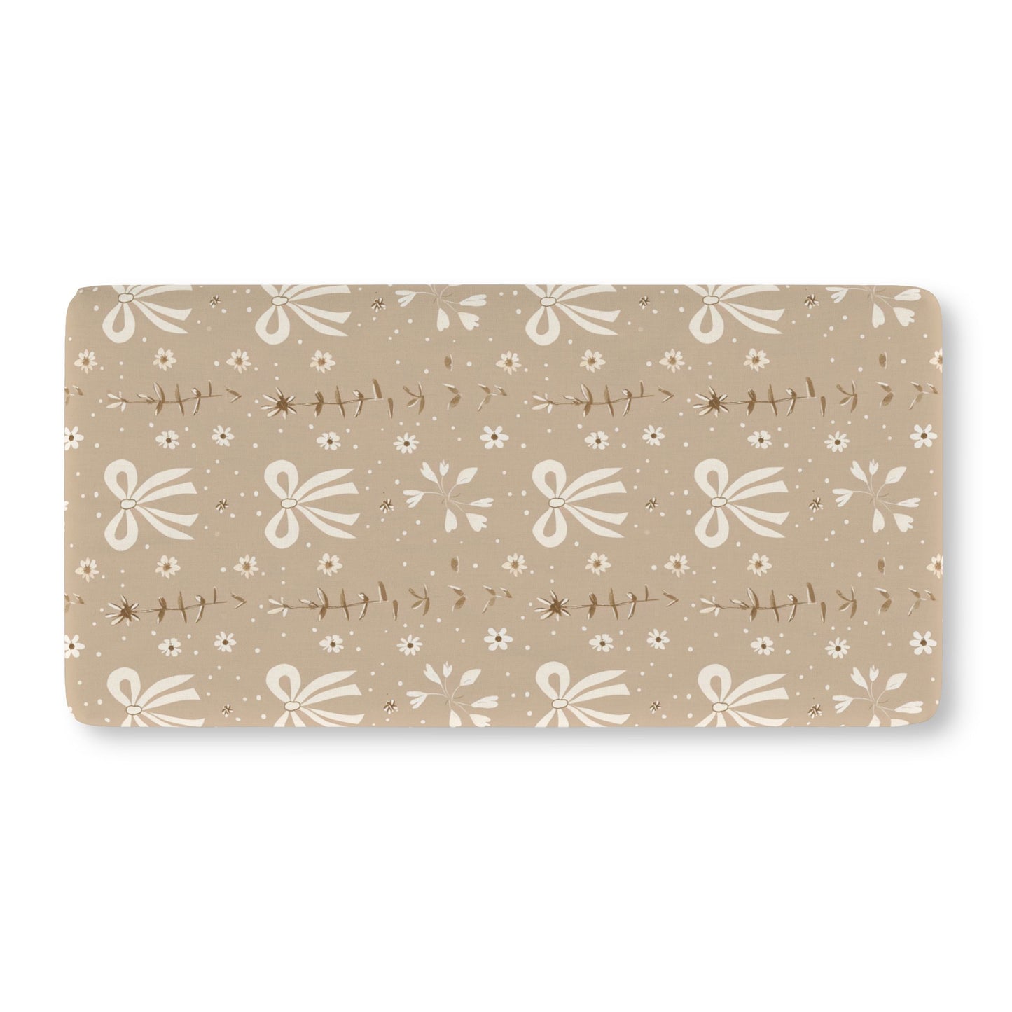 Fitted crib sheet with cream bows and daisies on taupe