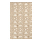 Bow and daisy nursery area rug in cream on soft taupe