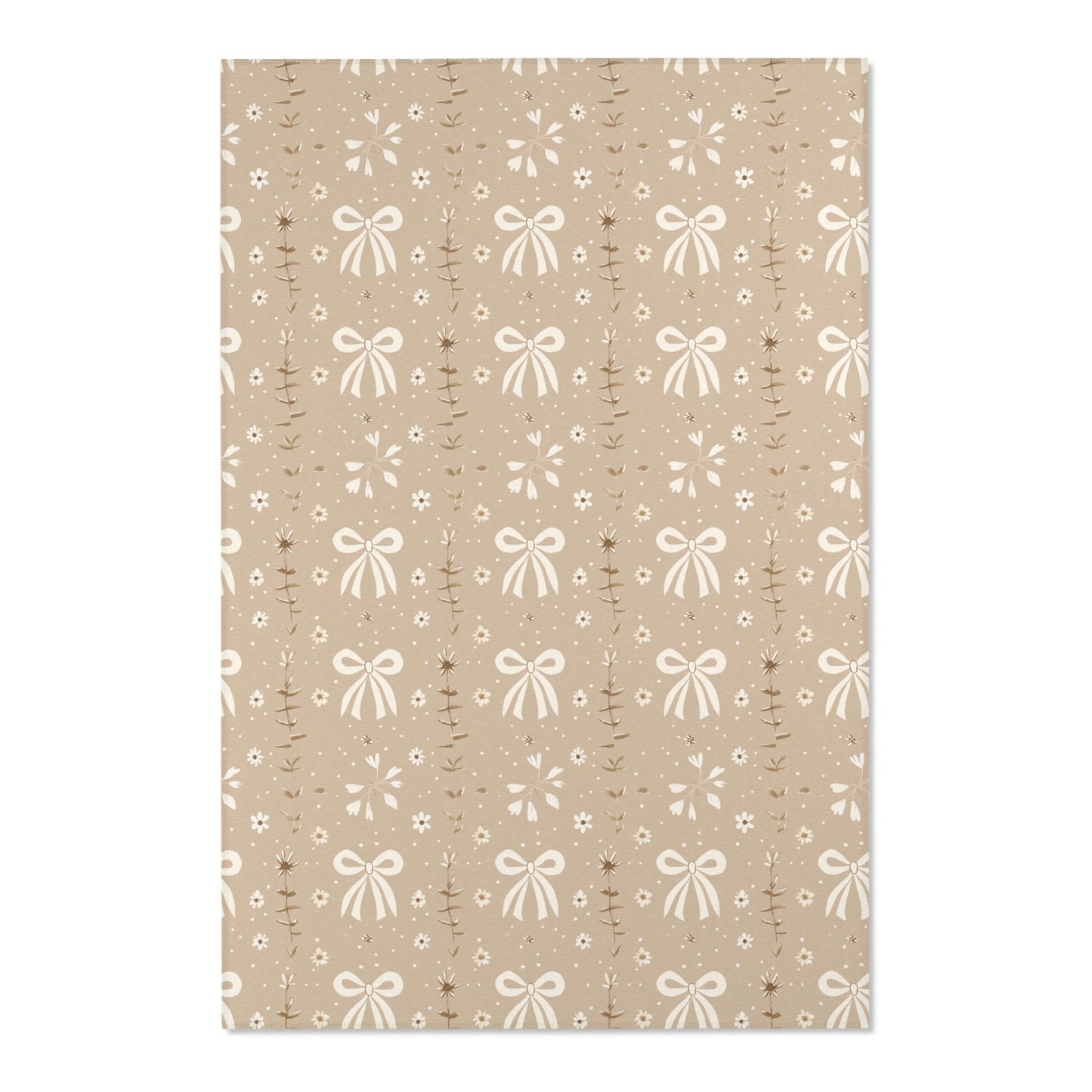 Close detail of the bows and leaf sprigs on the area rug