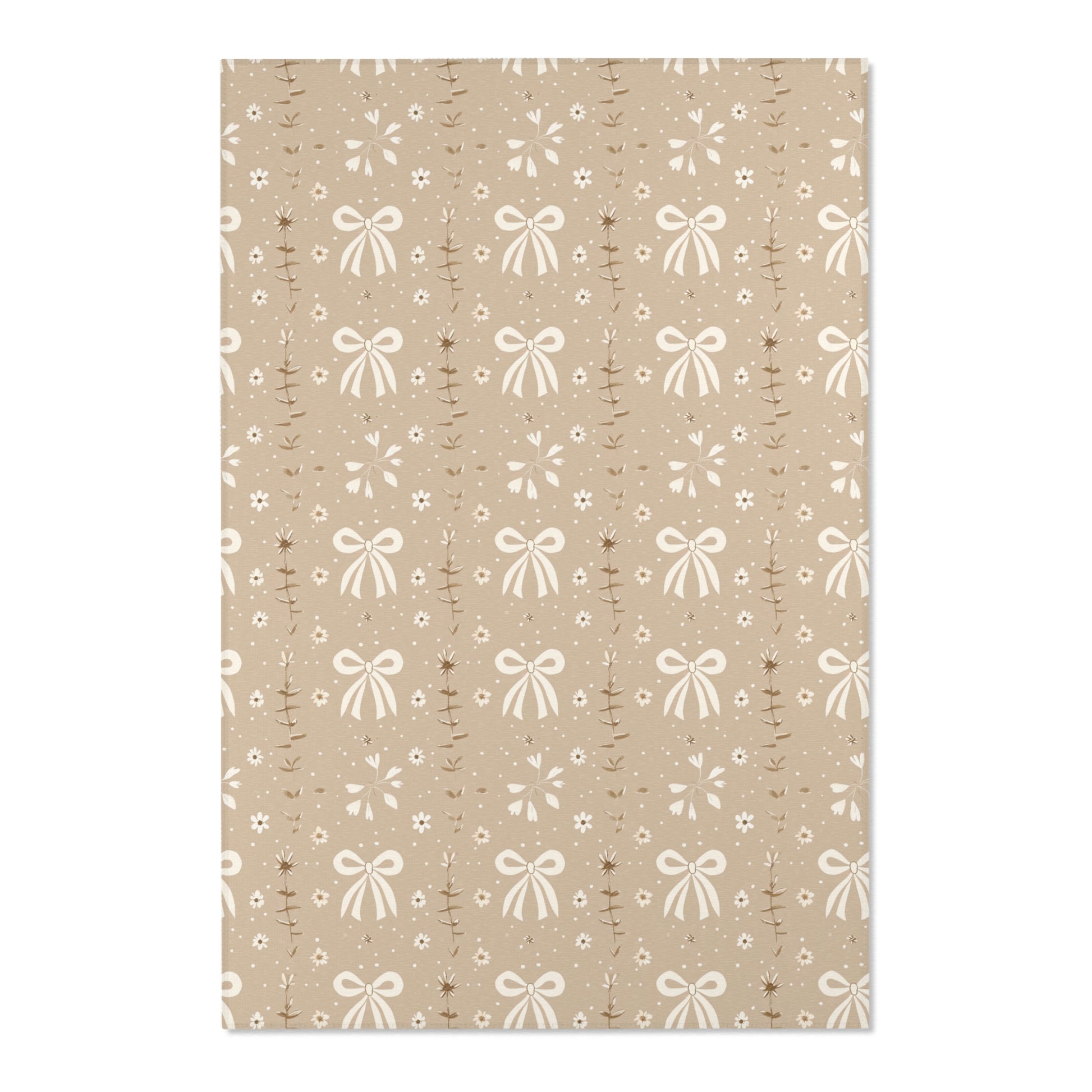Close detail of the bows and leaf sprigs on the area rug