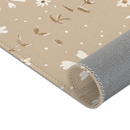 Nursery area rug in a soft taupe and cream palette