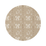 Ribbon Meadow round nursery rug on a baby room floor
