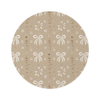 Ribbon Meadow round nursery rug on a baby room floor