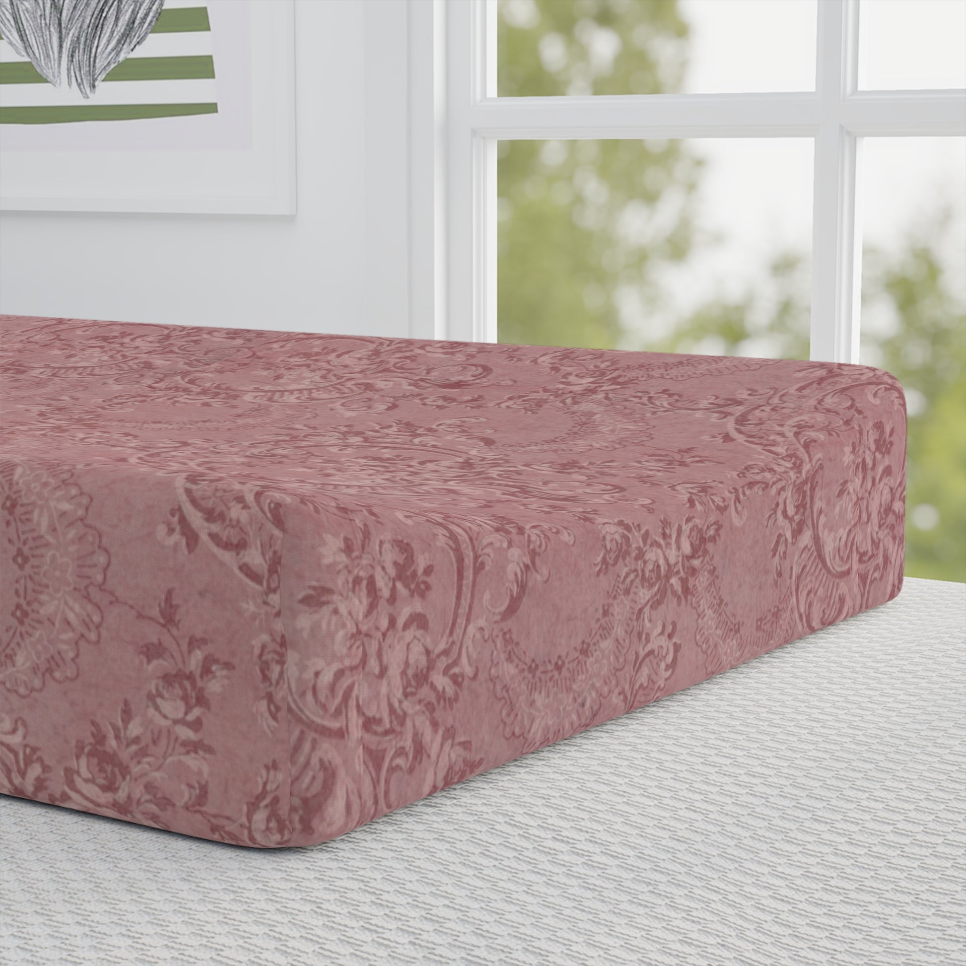 Close detail of the Rose Damask print on the changing pad cover