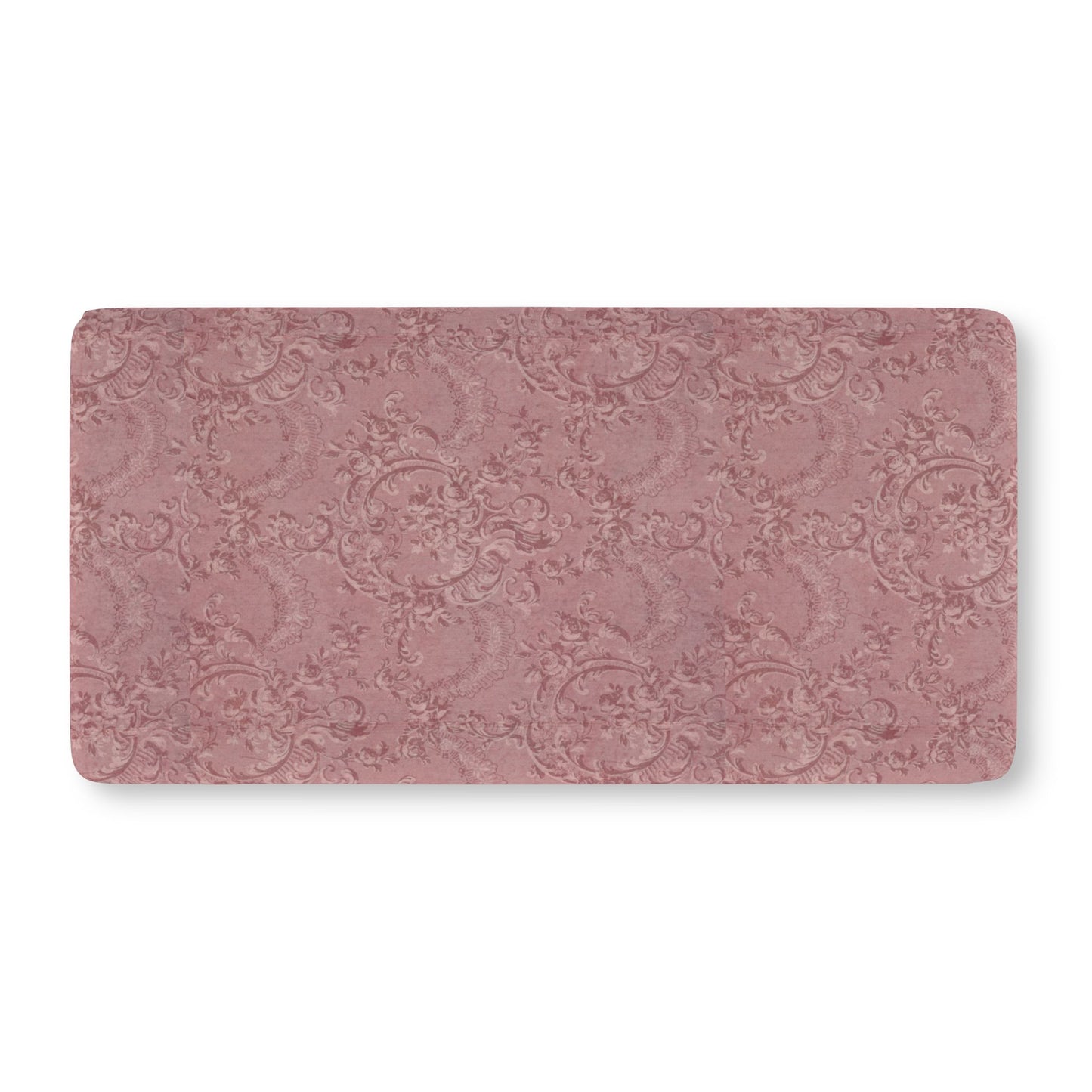 Fitted crib sheet in tonal dusty rose damask with scrollwork
