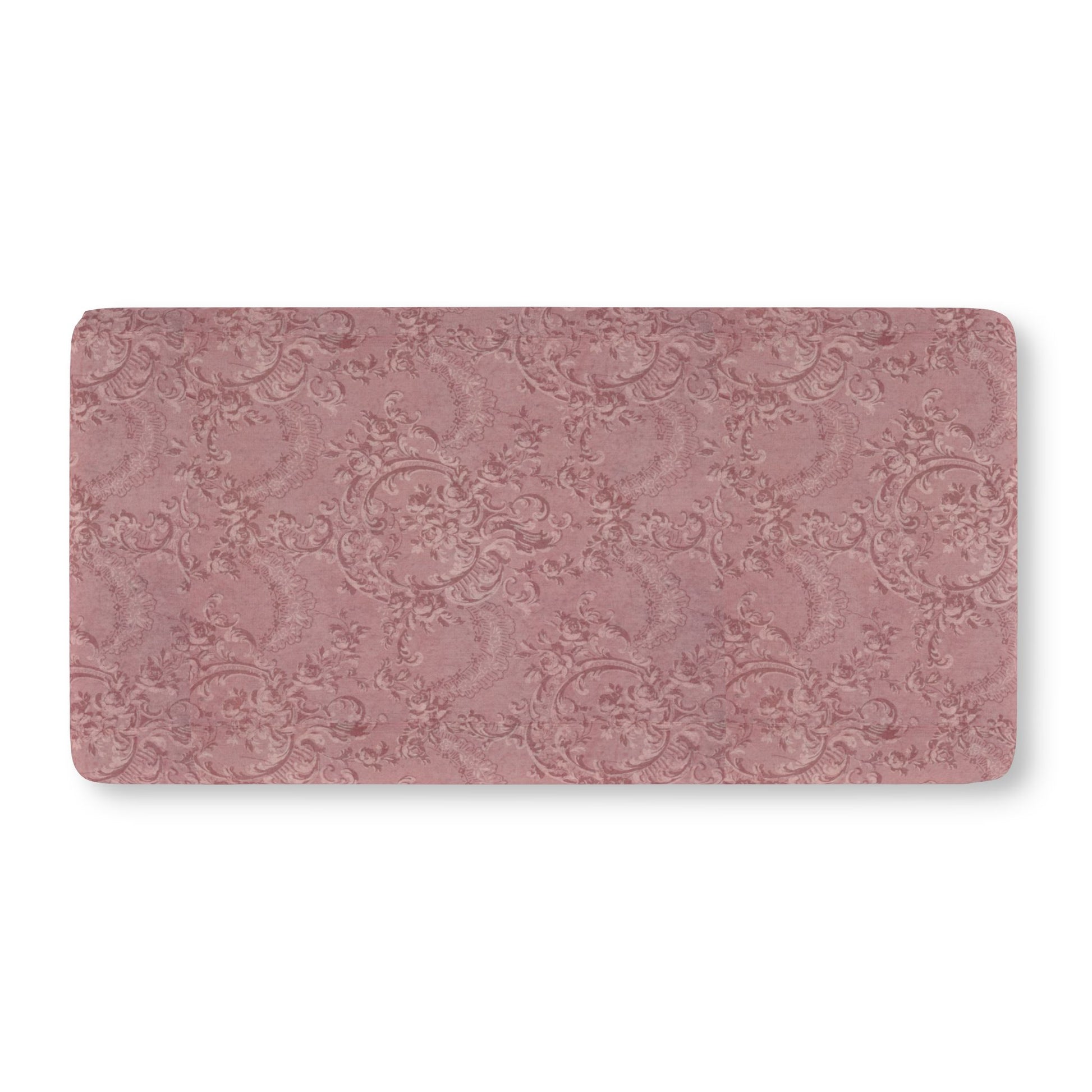 Fitted crib sheet in tonal dusty rose damask with scrollwork