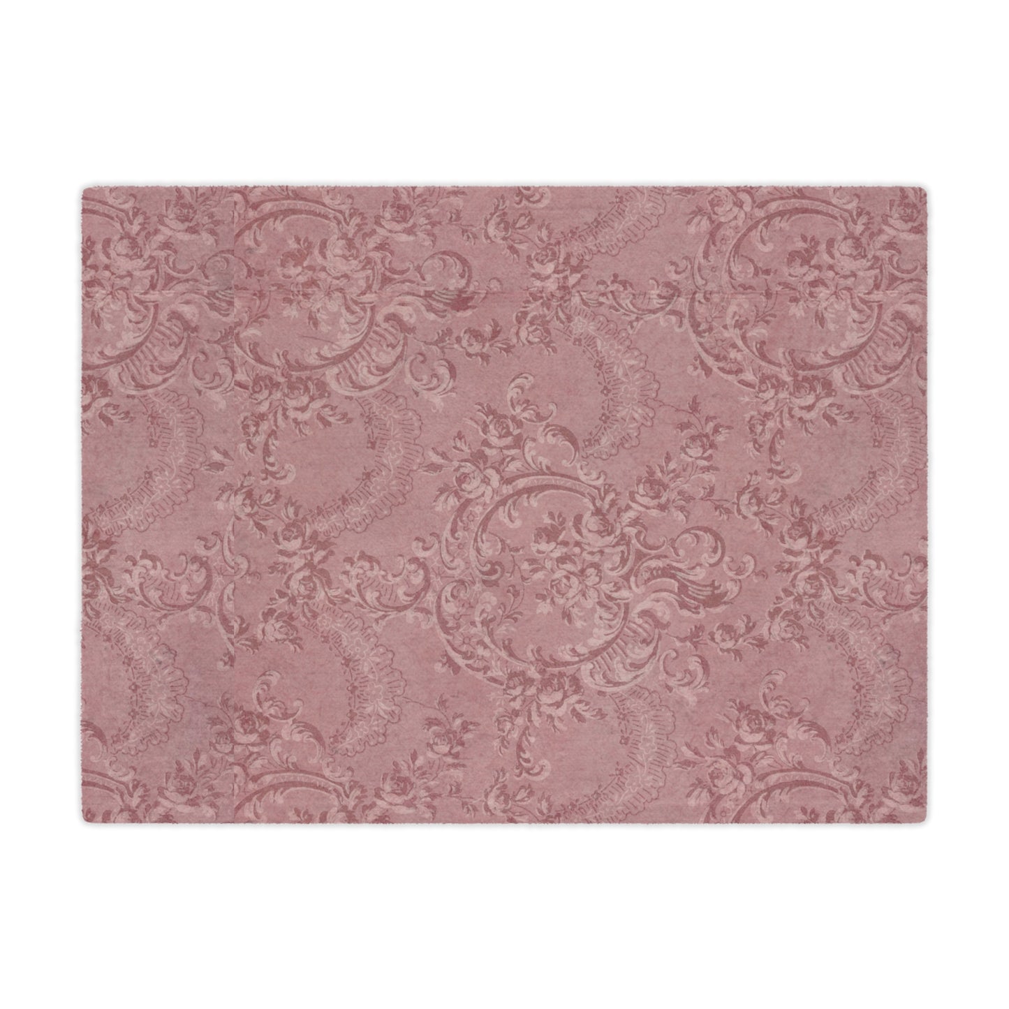 Close detail of the damask scrollwork on the minky blanket