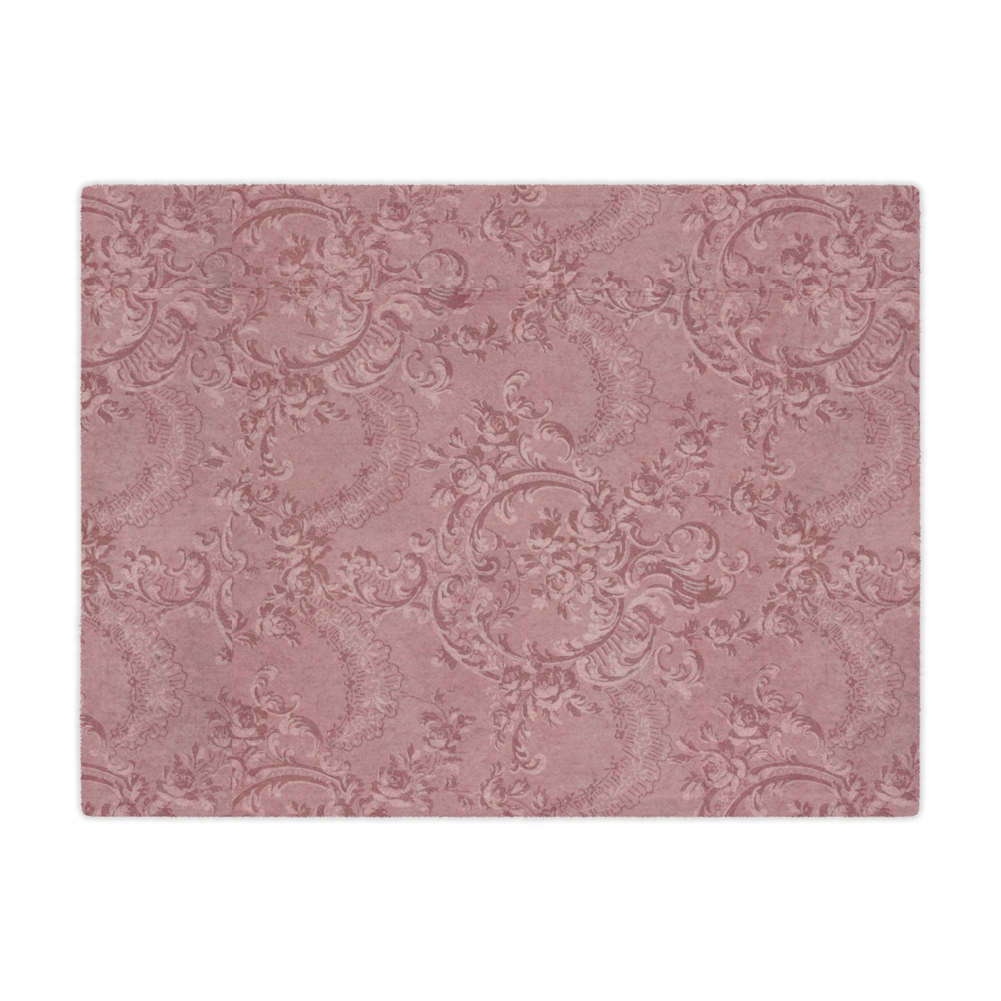 Close detail of the damask scrollwork on the minky blanket