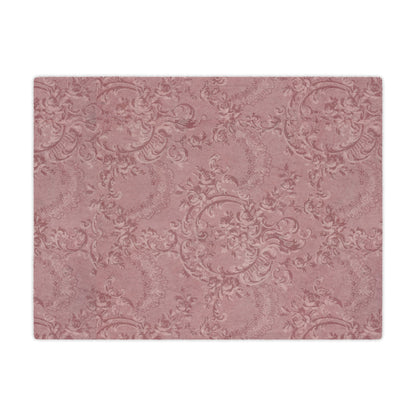 Close detail of the damask scrollwork on the minky blanket